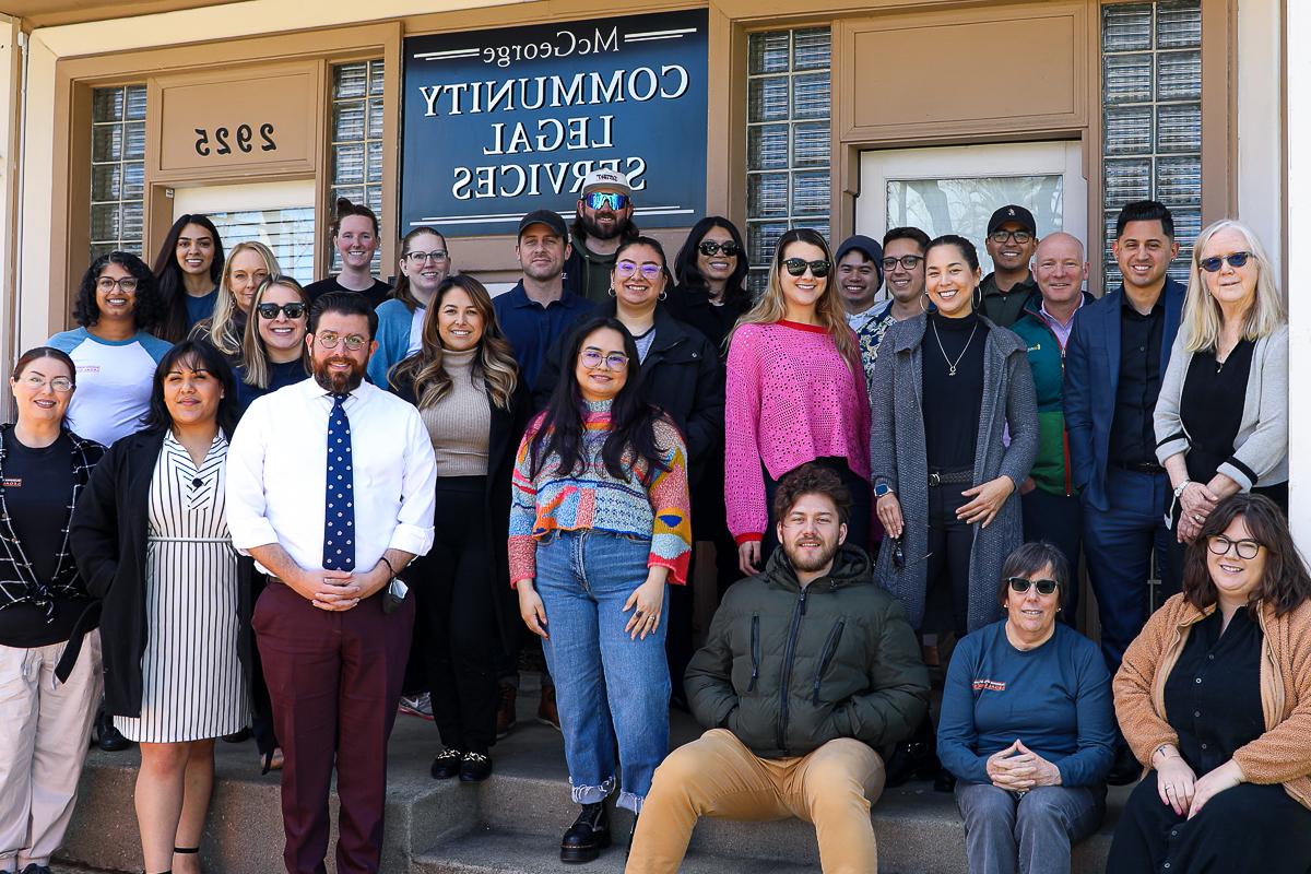 law students in front of the McGeorge Legal Services building